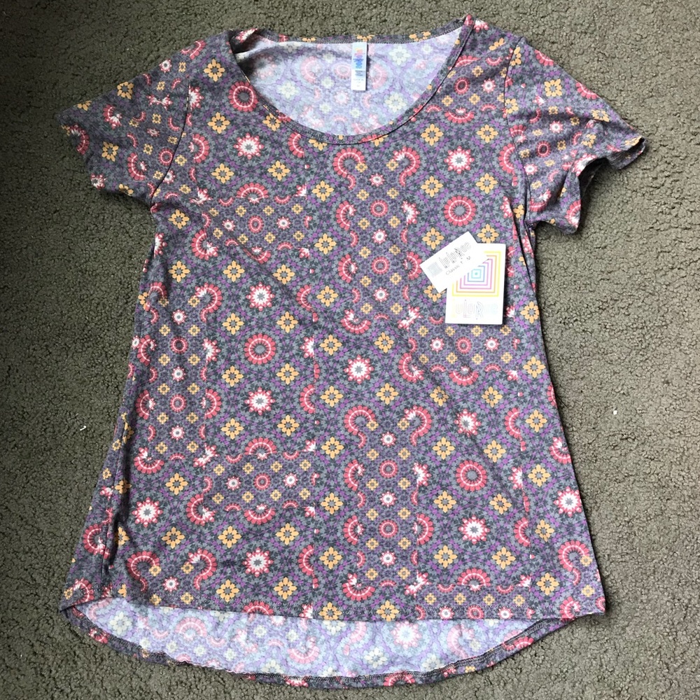 Lularoe Medium Classic T. NWT. Cute faded look.